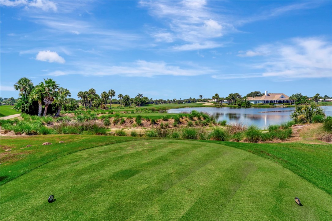 11 Caribe Way Vero Beach, FL 32963 - Photo 25 of 31 a view of a lake with houses in the back