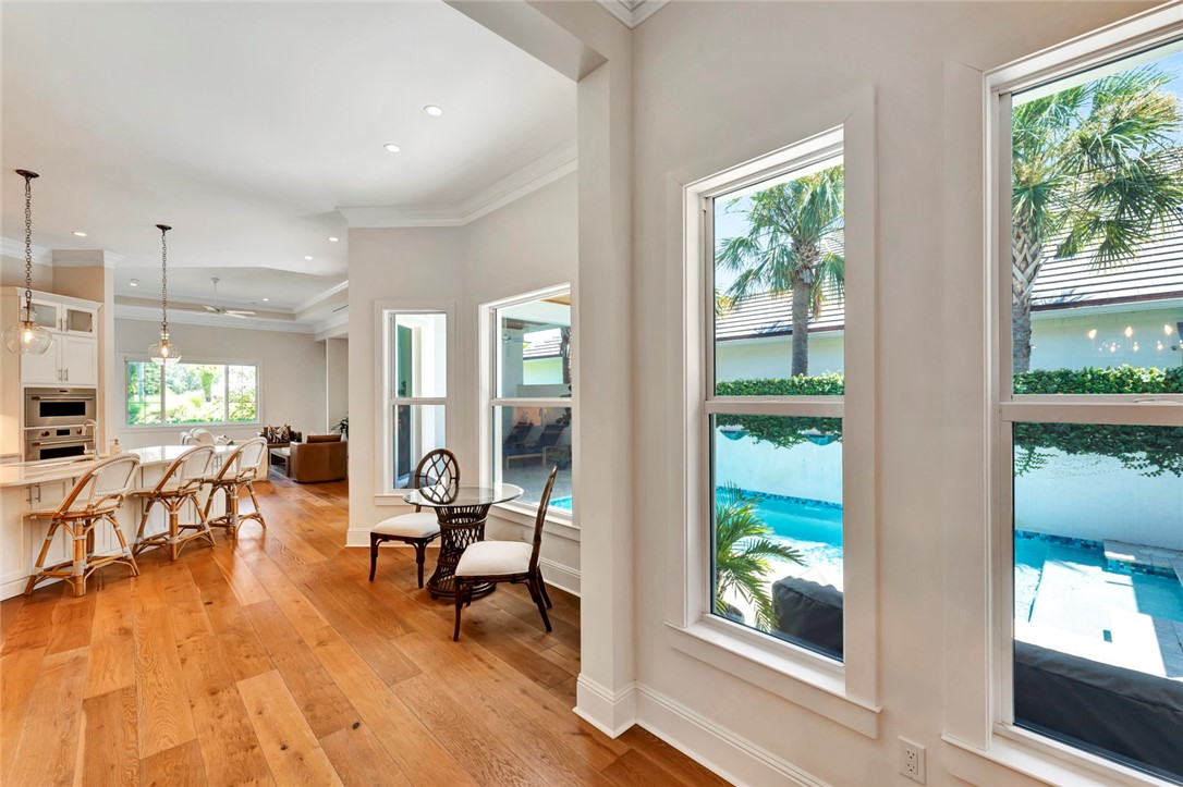 11 Caribe Way Vero Beach, FL 32963 - Photo 6 of 31 a living room with furniture and a large window