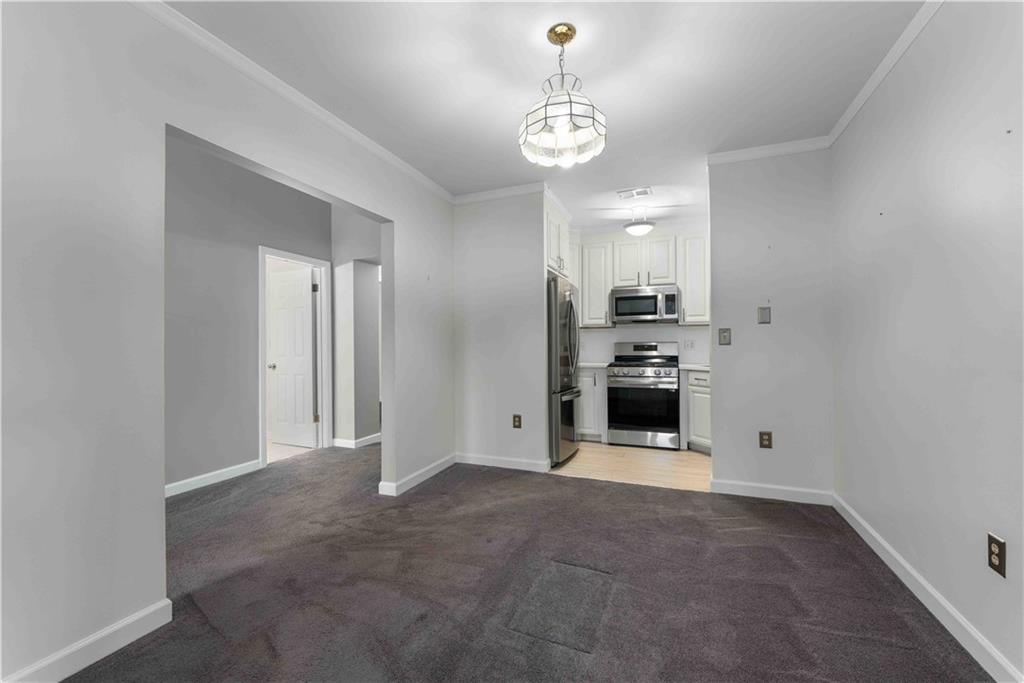 363 4th Street, Unit 6 Beaver, PA 15009 - Photo 13 of 34 The dedicated dining room creates a perfect space for everyday meals and entertaining.