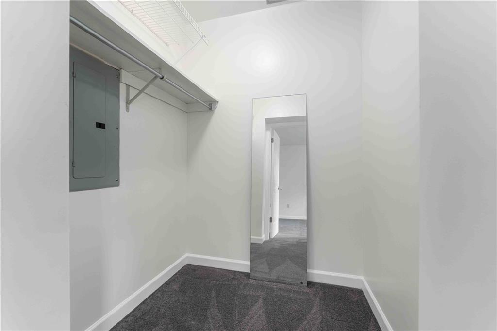 363 4th Street, Unit 6 Beaver, PA 15009 - Photo 20 of 34 The Primary Bedroom's walk-in-closet. There is plenty of space to add additional rods and shelves to suit your wardrobe's needs.