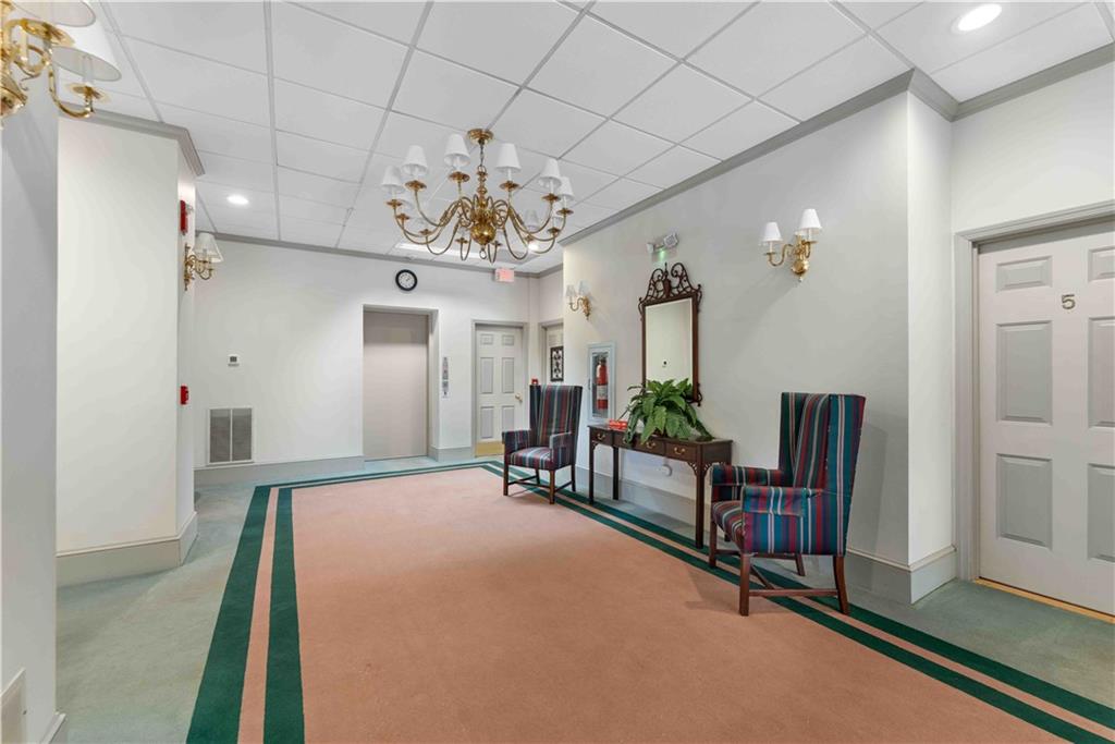 363 4th Street, Unit 6 Beaver, PA 15009 - Photo 2 of 34 The upper level of the main lobby. Unit # 6 is in the right rear corner.