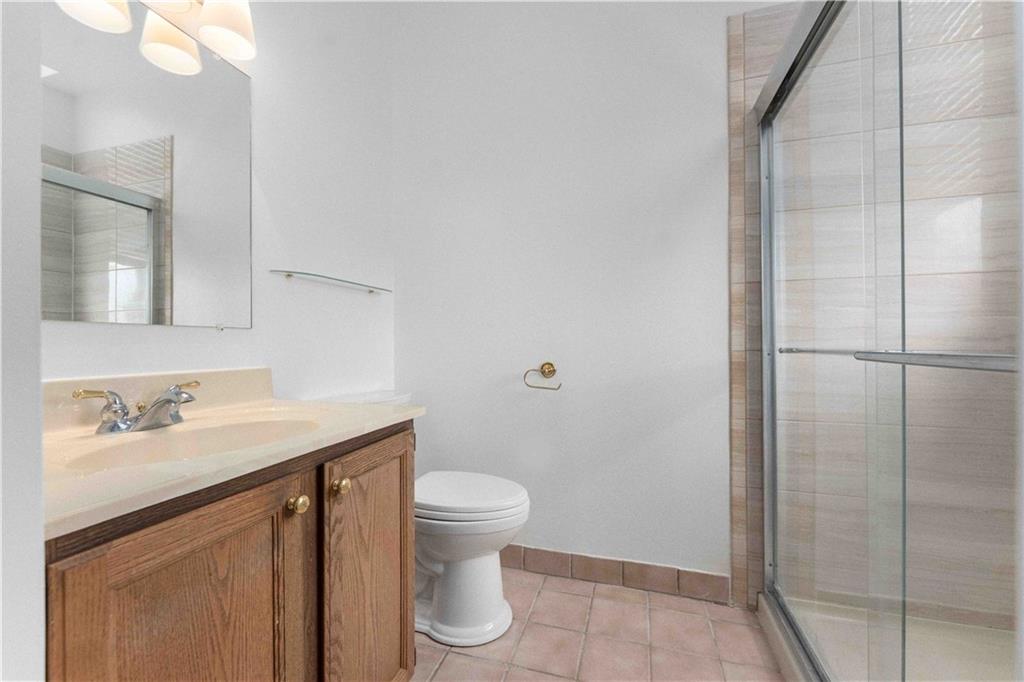 363 4th Street, Unit 6 Beaver, PA 15009 - Photo 21 of 34 Amply sized, you will appreciate the walk-in shower surrounded by tile for easy cleaning!