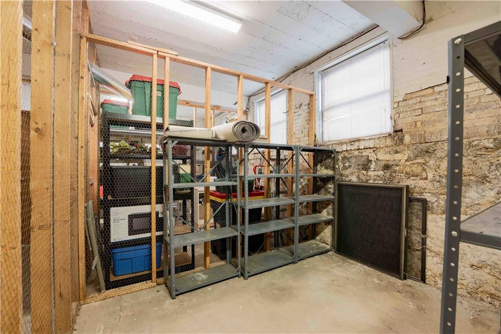 363 4th Street, Unit 6 Beaver, PA 15009 - Photo 33 of 34 Ample storage area in the basement with easy access to the elevator. Shelves are ready for your personal belongings!