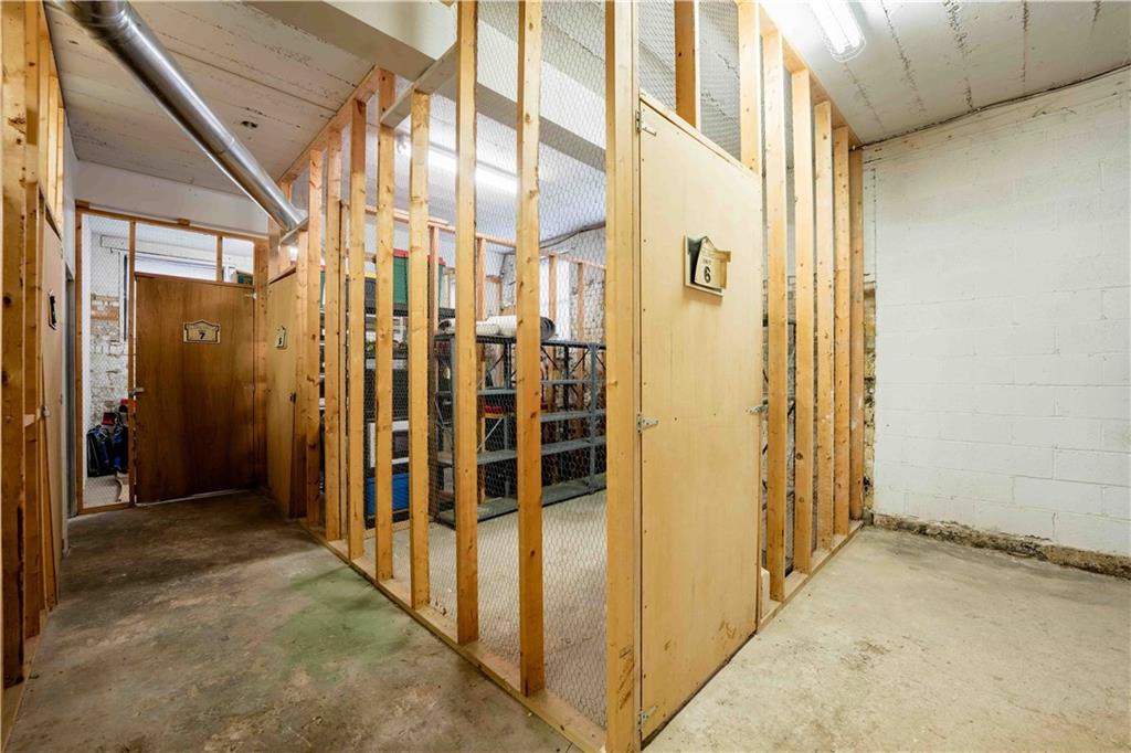 363 4th Street, Unit 6 Beaver, PA 15009 - Photo 34 of 34 Open air storage unit in the well lit basement. Shelves and extra carpeting are included.