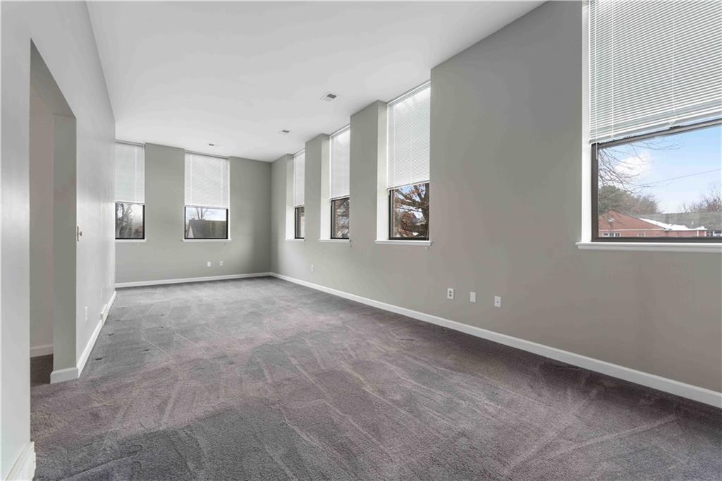 363 4th Street, Unit 6 Beaver, PA 15009 - Photo 9 of 34 Note the soaring ceilings and oversized windows that capture Mother Nature at its finest!