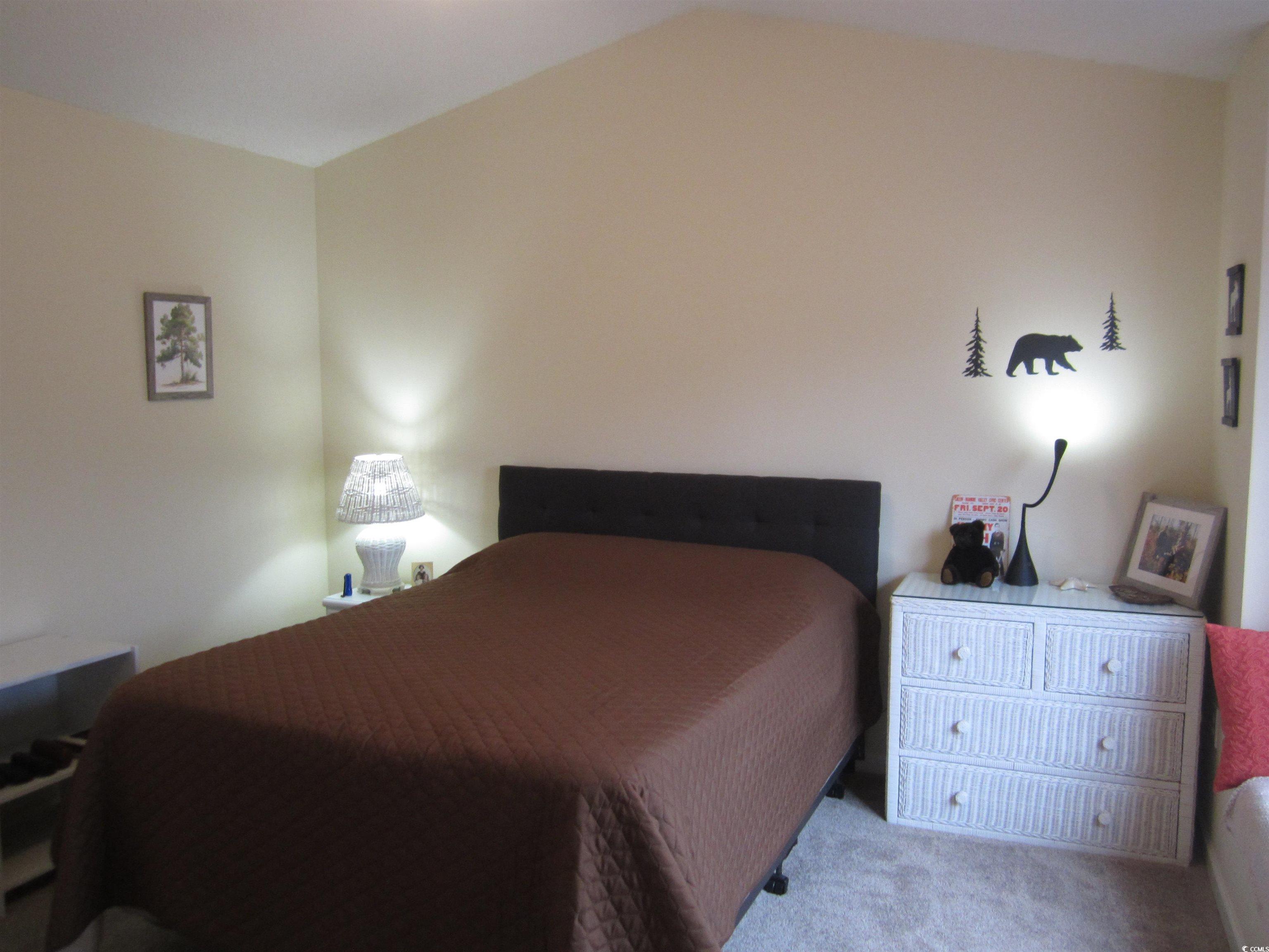1071 Pinwheel Loop, Unit 1071 Myrtle Beach, SC 29577 - Photo 21 of 39 View of carpeted bedroom