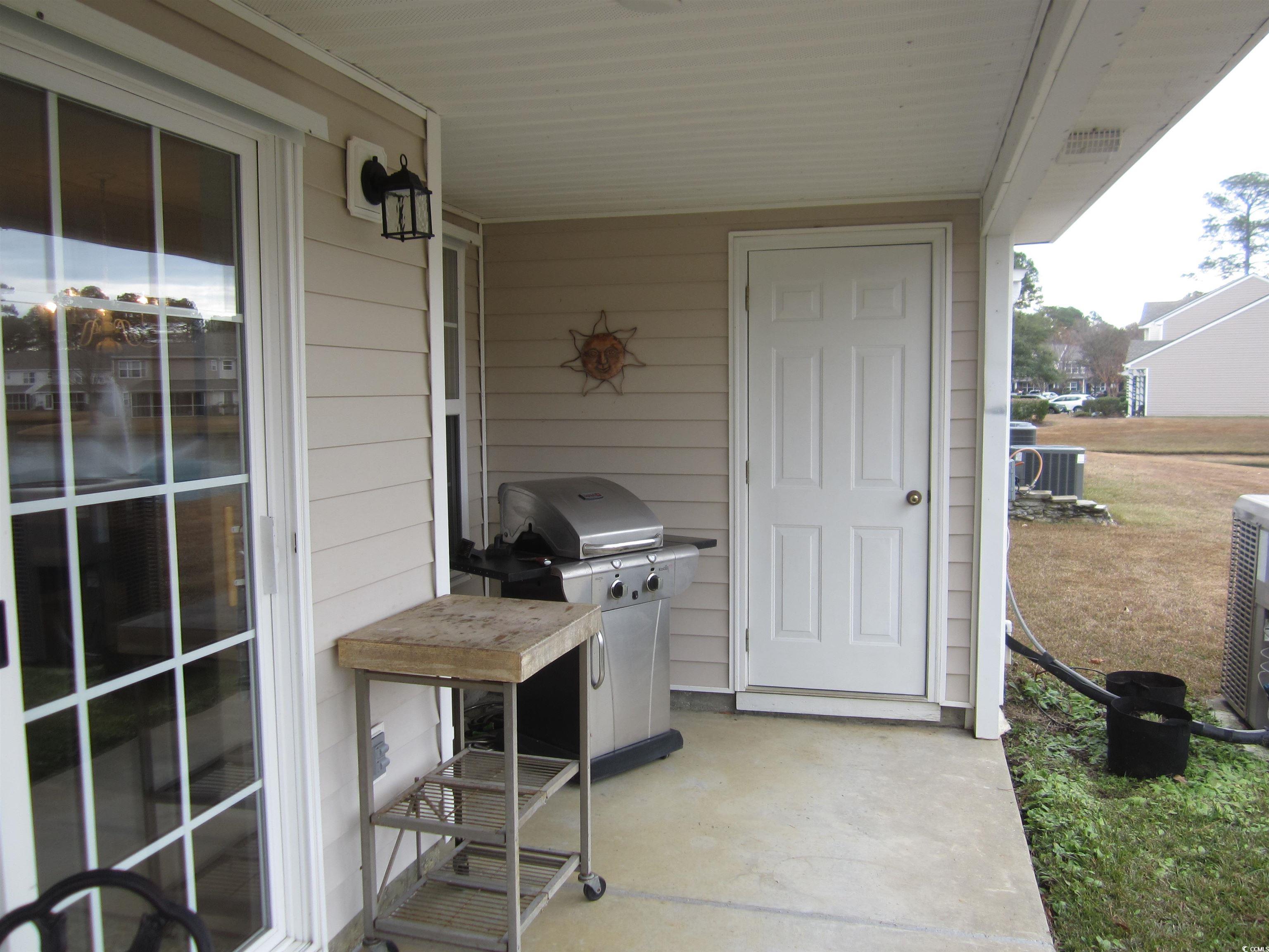 1071 Pinwheel Loop, Unit 1071 Myrtle Beach, SC 29577 - Photo 29 of 39 View of patio / terrace with grilling area