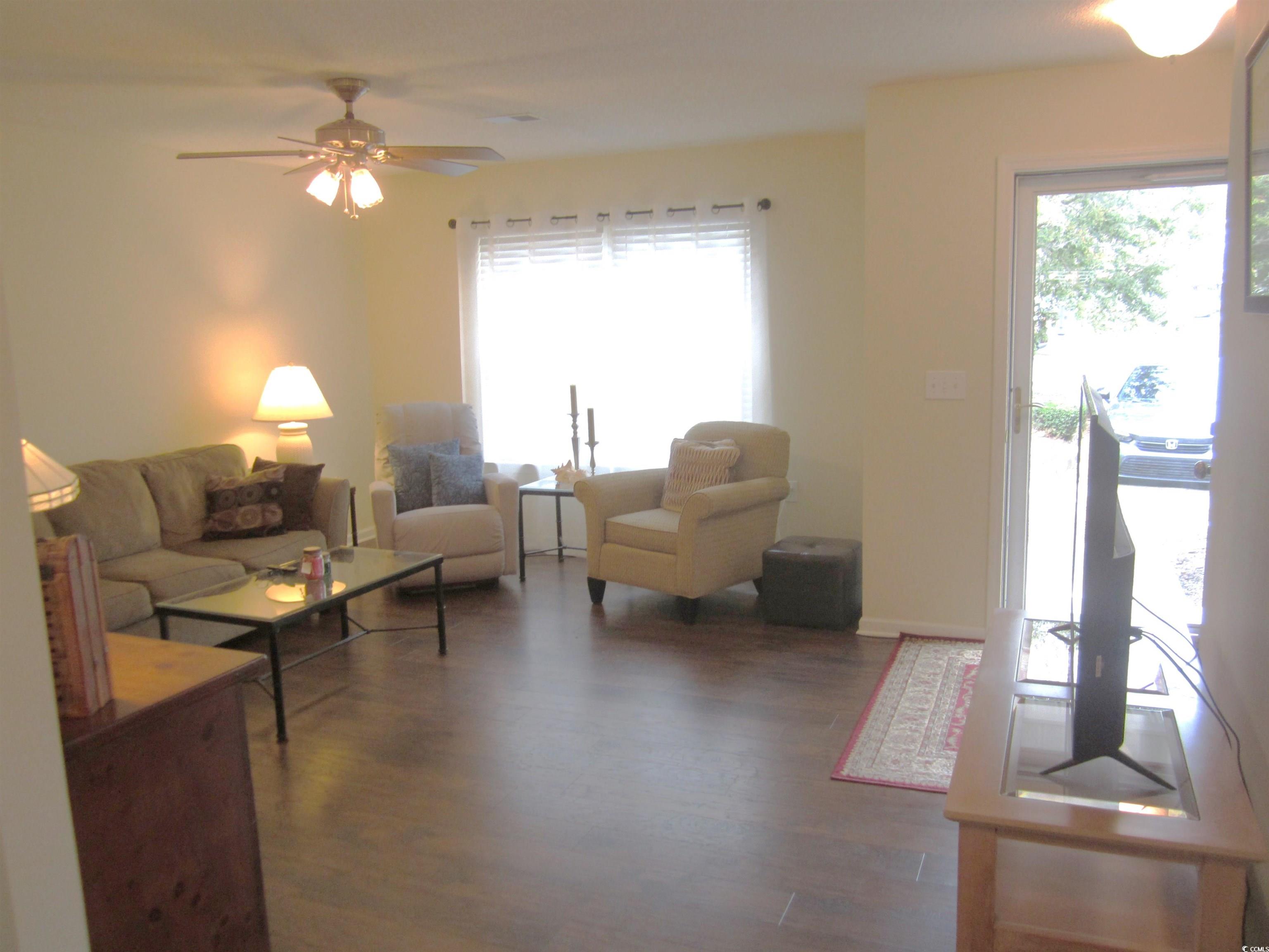 1071 Pinwheel Loop, Unit 1071 Myrtle Beach, SC 29577 - Photo 5 of 39 Living room featuring a wealth of natural light, c