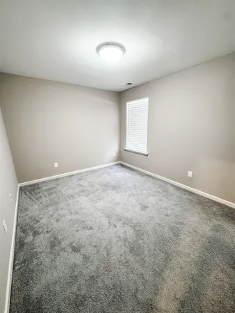 an empty room with a natural light