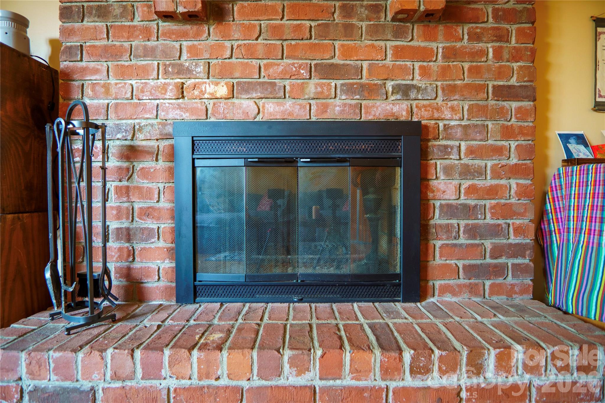 84 Forest Trail Balsam Grove, NC 28708 - Photo 12 of 45 a bedroom with a bed and a mirror