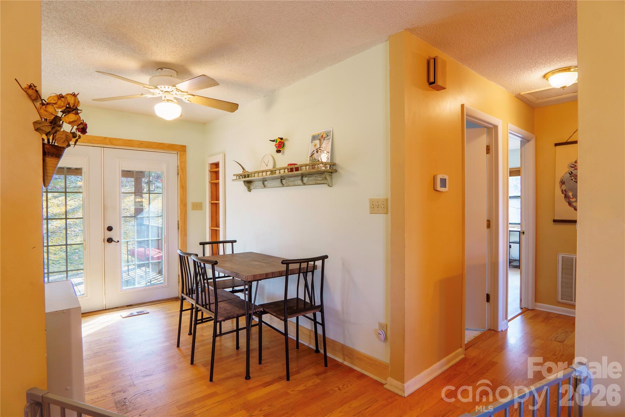 84 Forest Trail Balsam Grove, NC 28708 - Photo 18 of 45 a view of a dining room with furniture and wooden floor