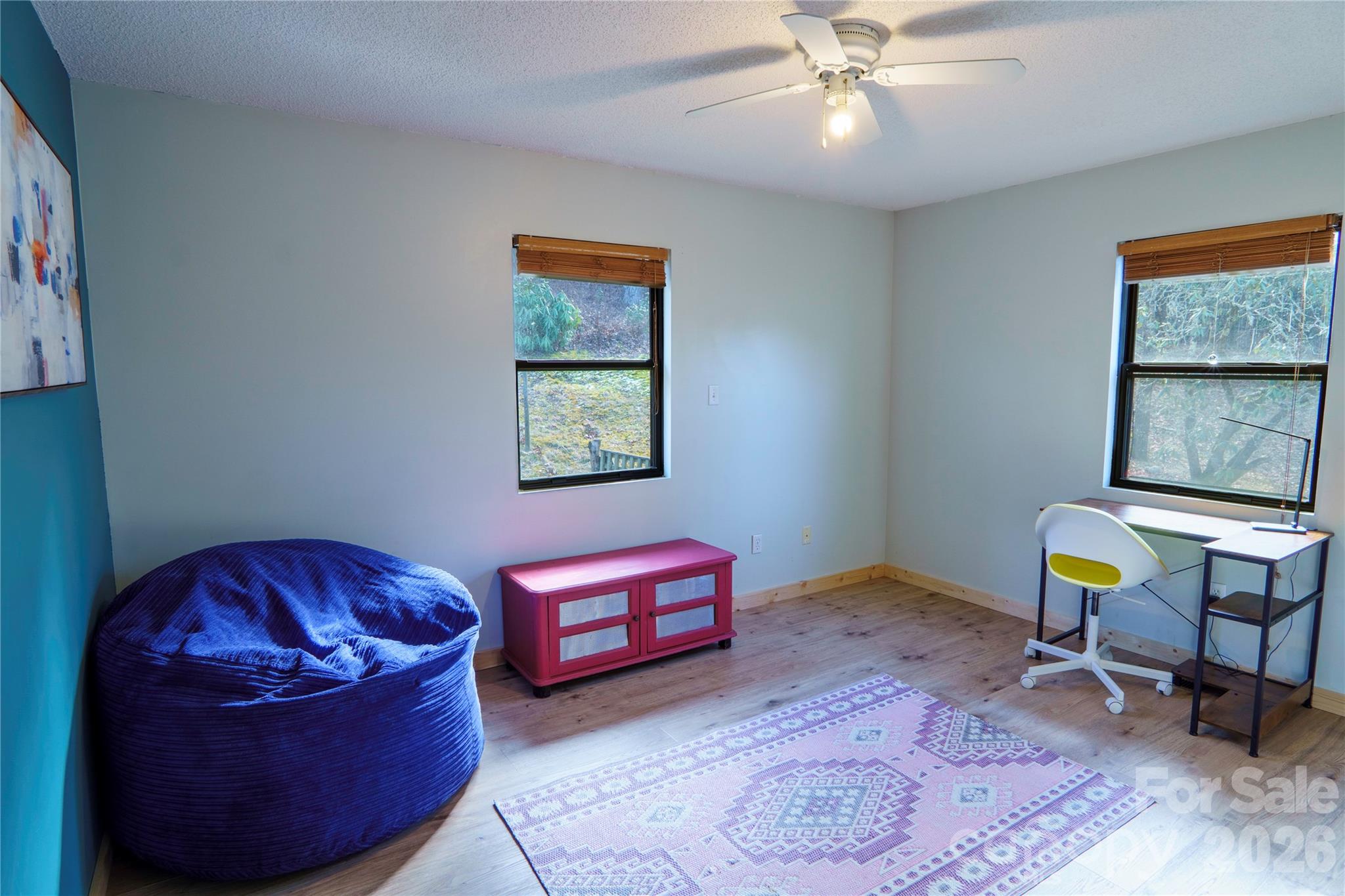 84 Forest Trail Balsam Grove, NC 28708 - Photo 26 of 45 a living room with furniture and a window