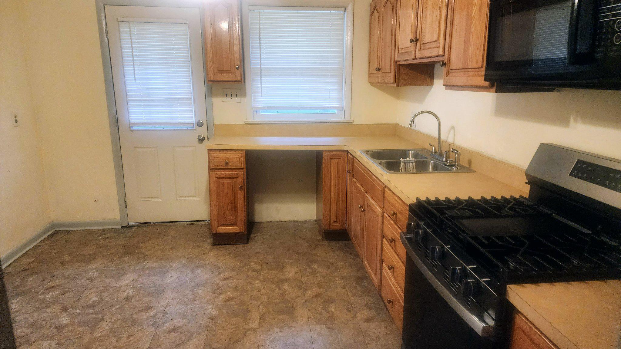 7612 Moores Road Brandywine, MD 20613 - Photo 6 of 15 Cozy kitchen with rear exit.