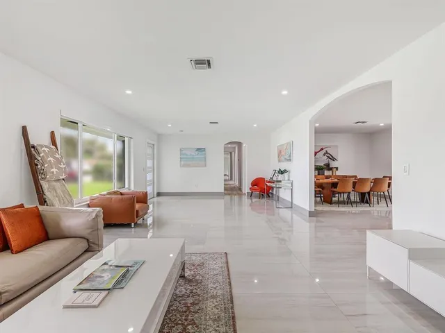 a living room with furniture and a couch