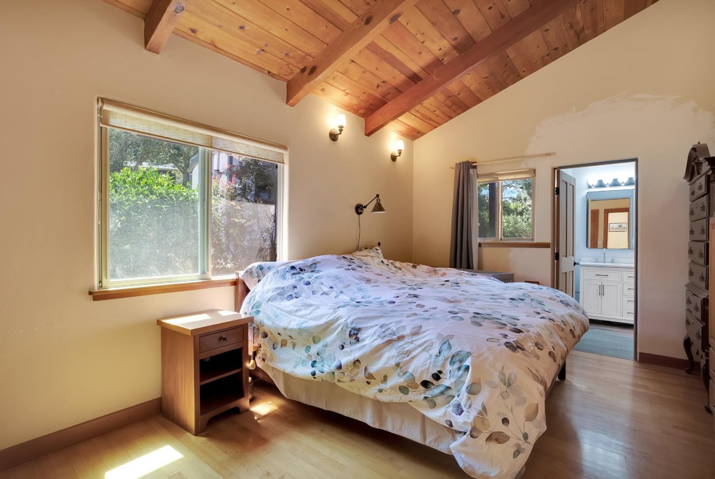 151 Rancho Road Watsonville, CA 95076 - Photo 13 of 56 a bedroom with a bed and wooden floor