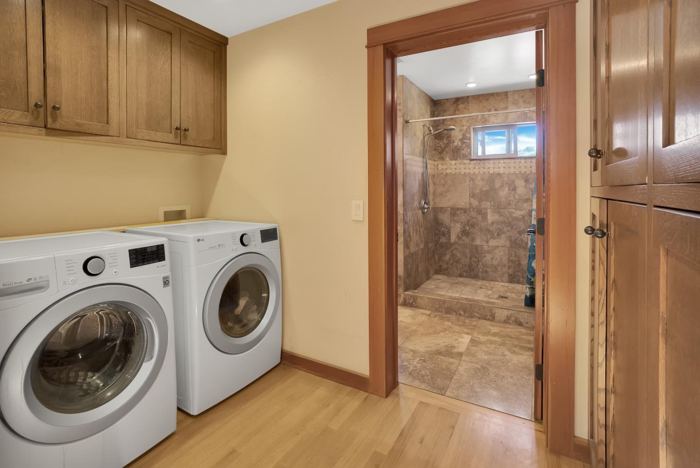 151 Rancho Road Watsonville, CA 95076 - Photo 18 of 56 a view of storage and utility room with washer and dryer