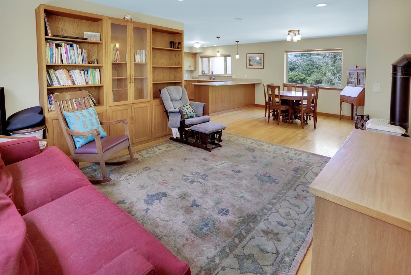 151 Rancho Road Watsonville, CA 95076 - Photo 26 of 56 a living room filled with furniture and a book shelf