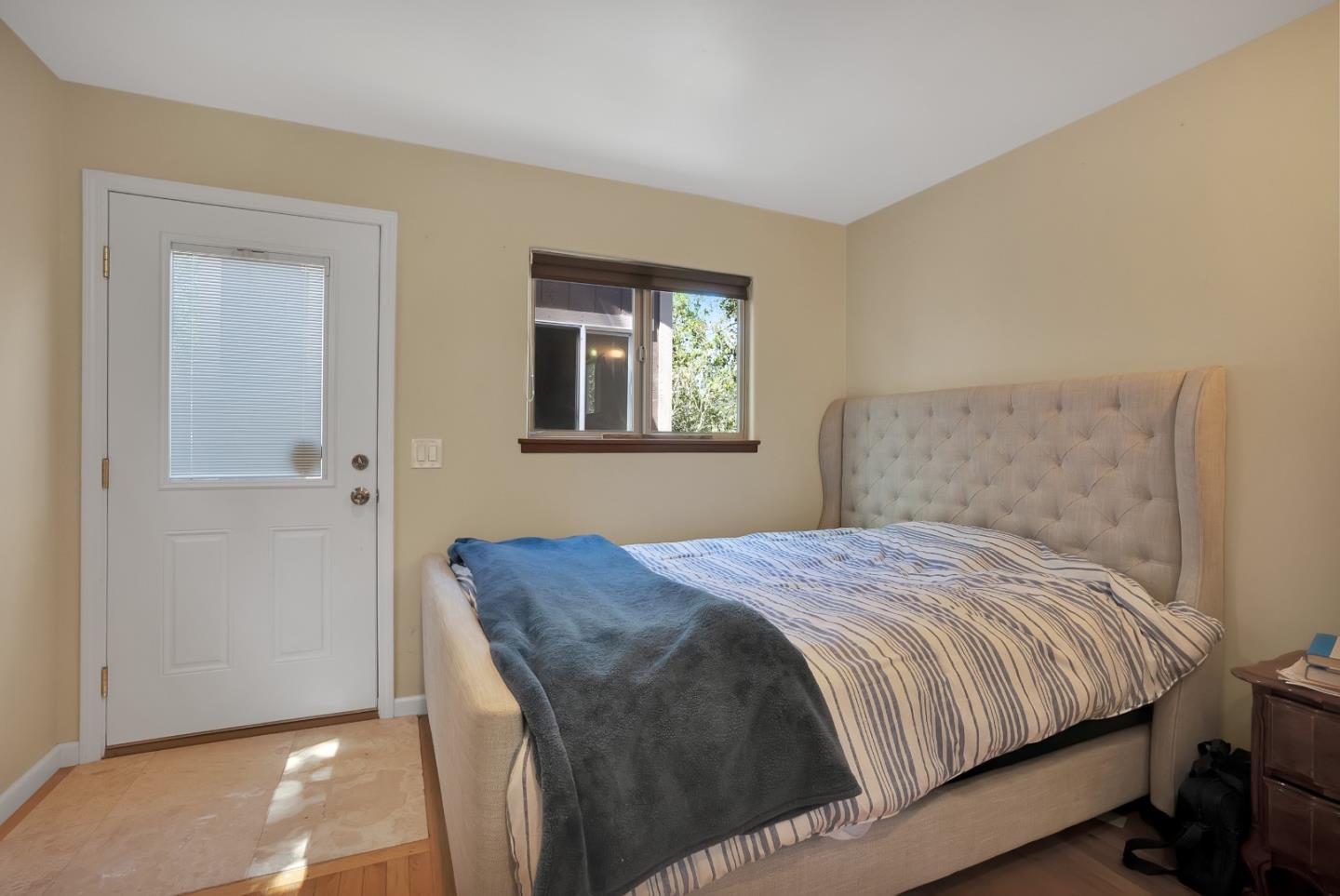 151 Rancho Road Watsonville, CA 95076 - Photo 28 of 56 a bedroom with a bed and a window