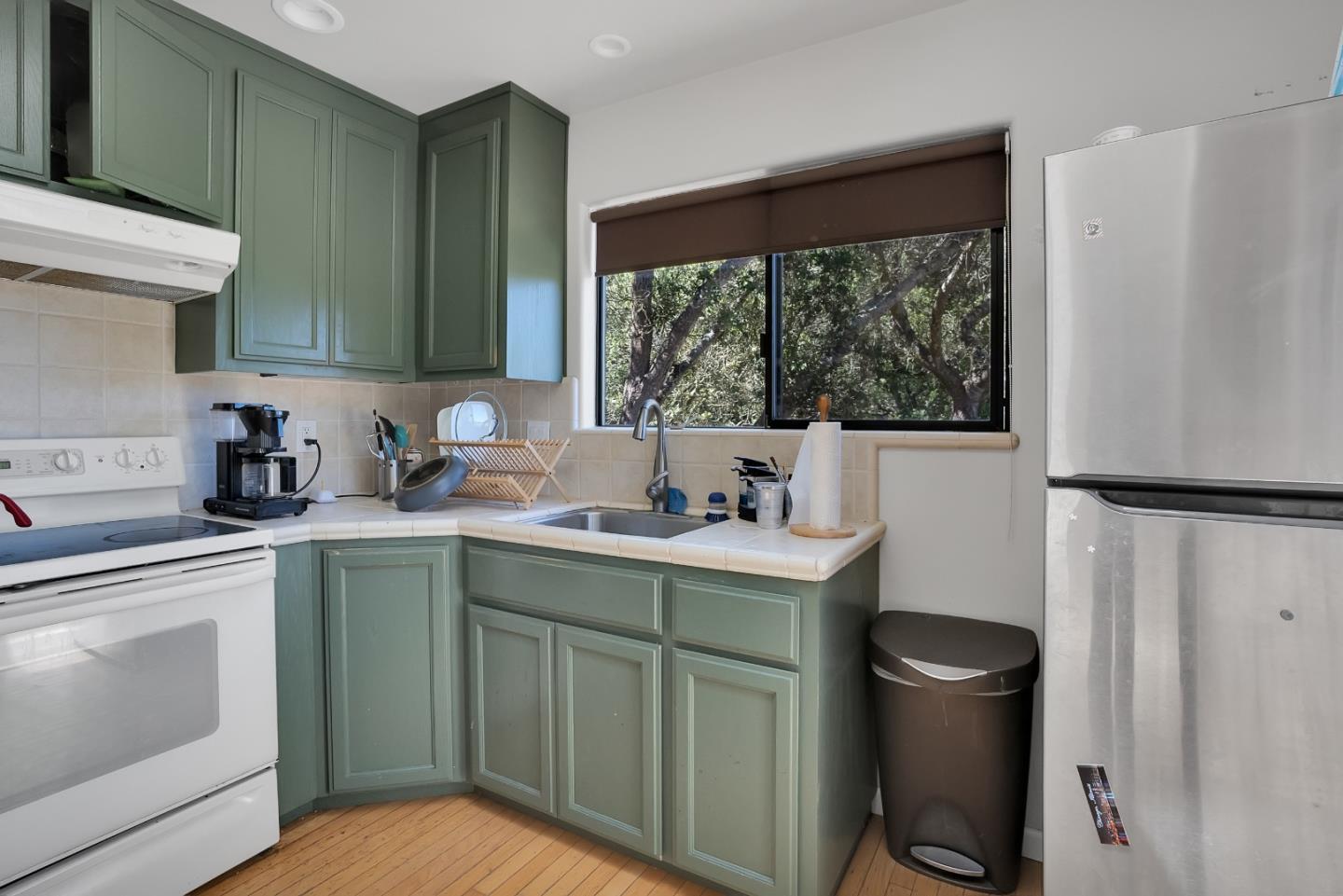 151 Rancho Road Watsonville, CA 95076 - Photo 36 of 56 a kitchen with a sink cabinets and window
