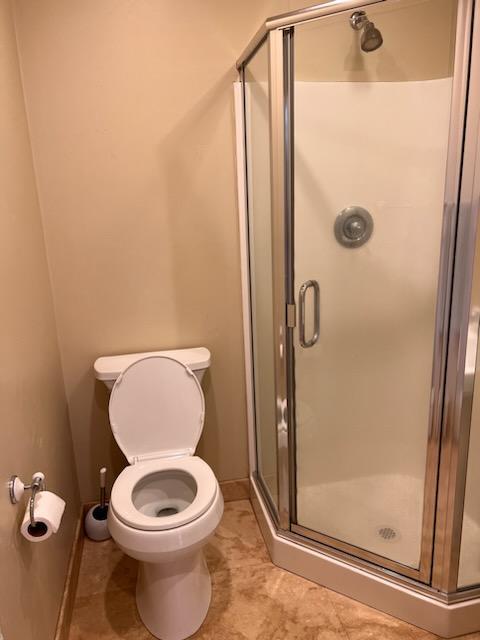 151 Rancho Road Watsonville, CA 95076 - Photo 54 of 56 a white toilet sitting next to a bathroom sink