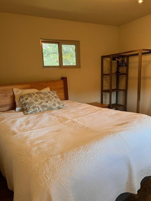 151 Rancho Road Watsonville, CA 95076 - Photo 56 of 56 a bedroom with a bed and a window