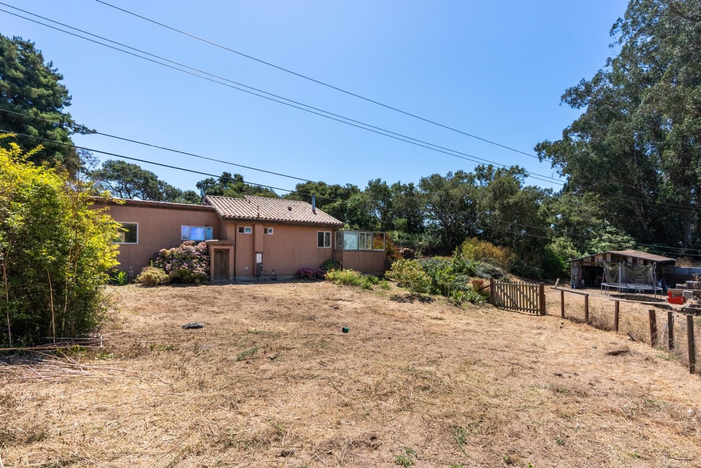 151 Rancho Road Watsonville, CA 95076 - Photo 6 of 56 a pathway of a house with a yard