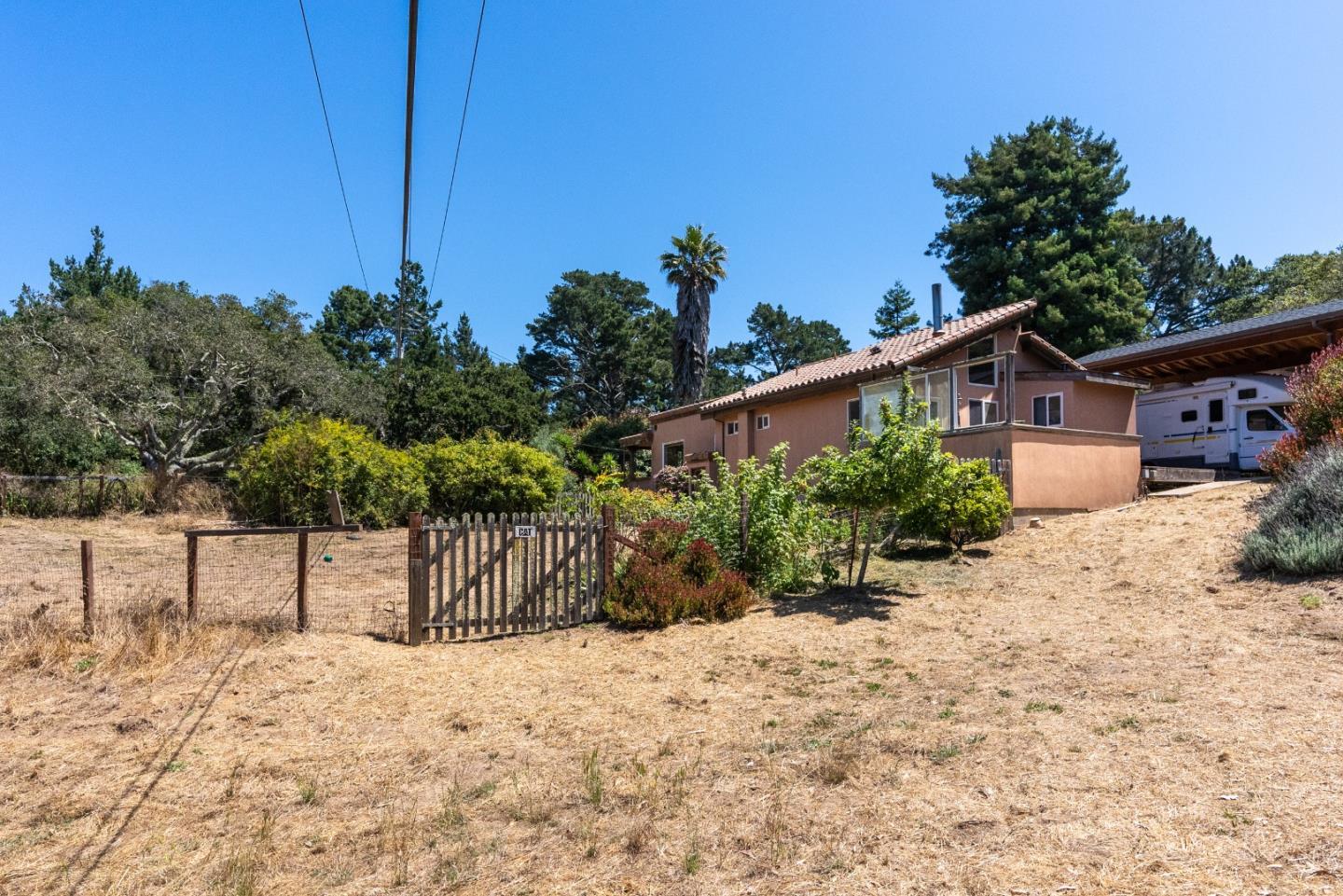151 Rancho Road Watsonville, CA 95076 - Photo 9 of 56 a view of a backyard with potted plants