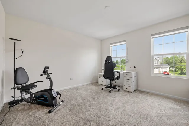 a view of a workspace with gym equipment