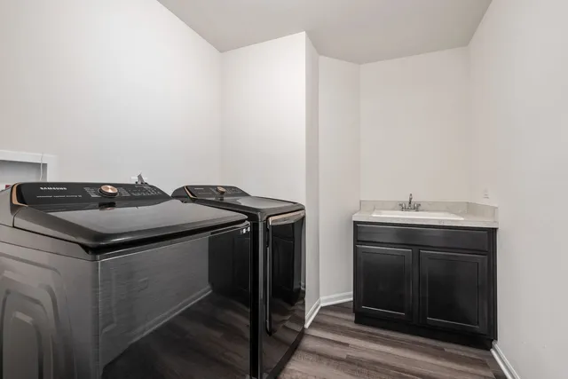 a utility room with washer and dryer