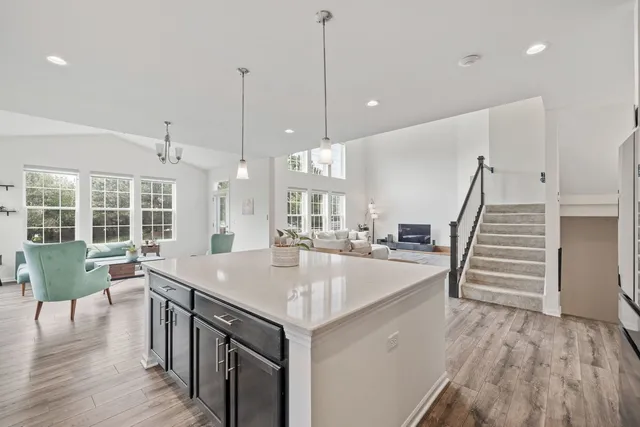 a very nice looking dining room with a table and chairs