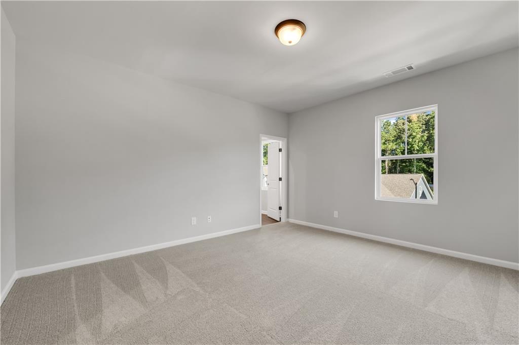 660 Devon Alley Acworth, GA 30102 - Photo 20 of 32 an empty room with windows