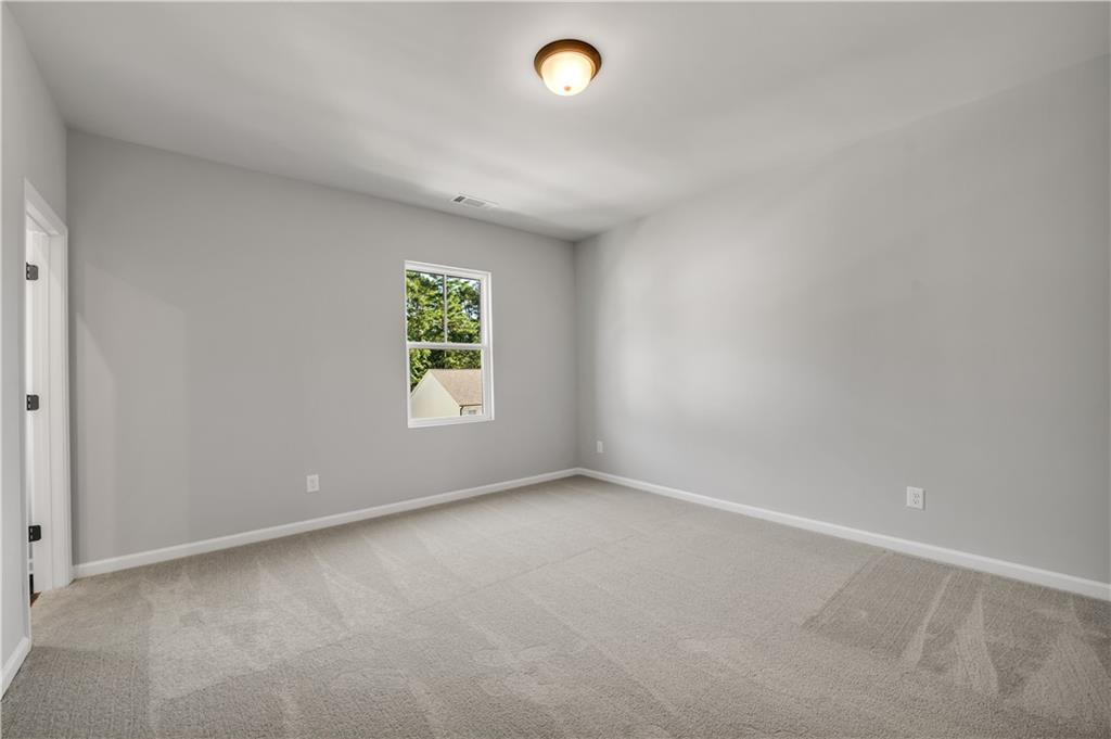 660 Devon Alley Acworth, GA 30102 - Photo 21 of 32 an empty room with windows