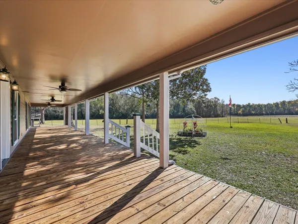 a view of a living room and bathroom