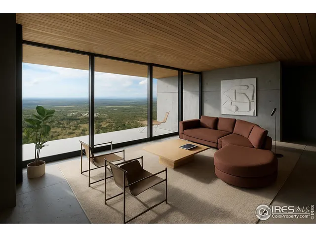 a view of a street with mountains in the background