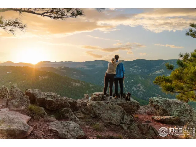 a view of a lake with mountains in the background