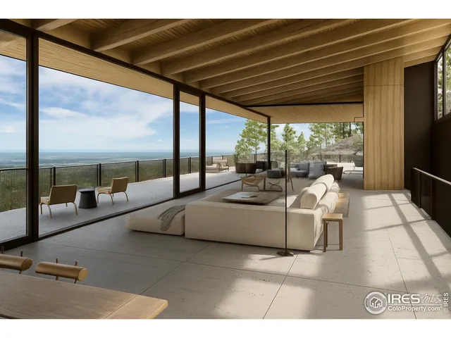 a living room with couch and a flat screen tv