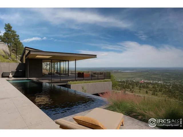 a view of a swimming pool with an outdoor seating