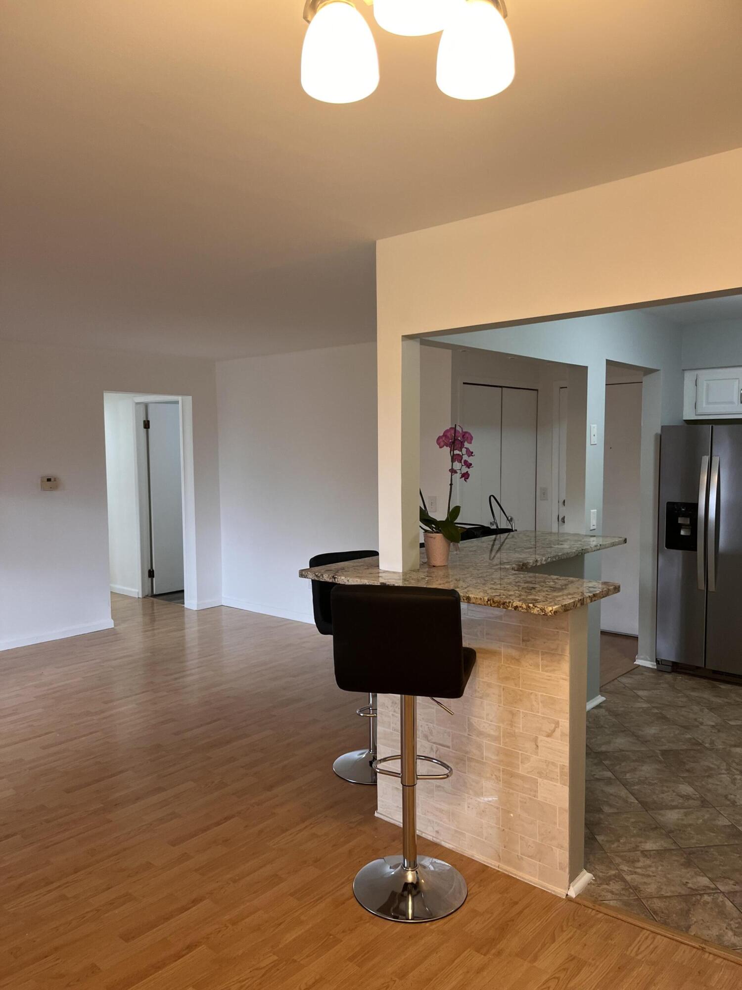 30445 West 14 Mile Road, Unit 59 Farmington Hills, MI 48334 - Photo 5 of 10 kitchen living