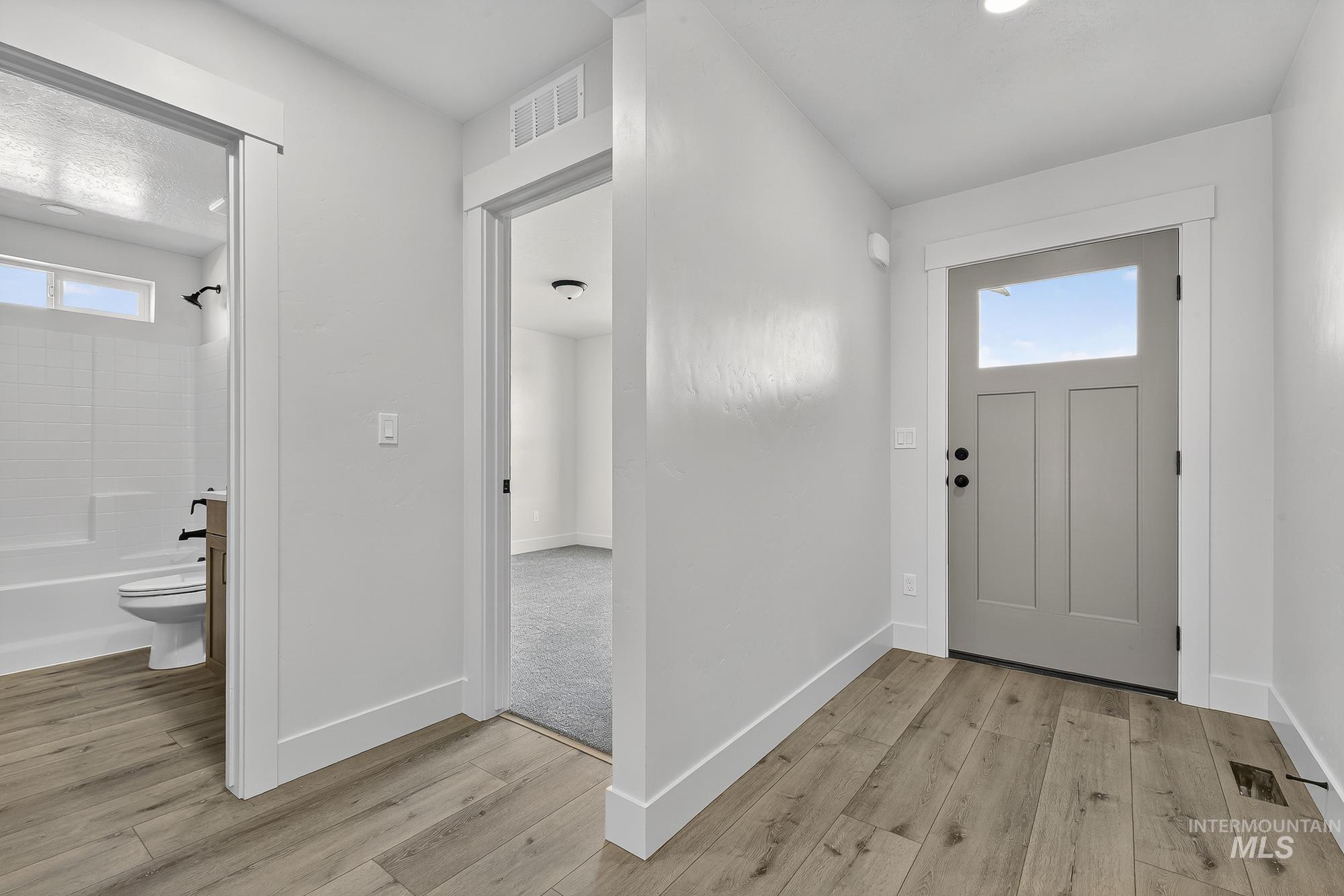1158 Velvet Loop Wilder, ID 83676 - Photo 24 of 34 Foyer entrance with light wood finished floors