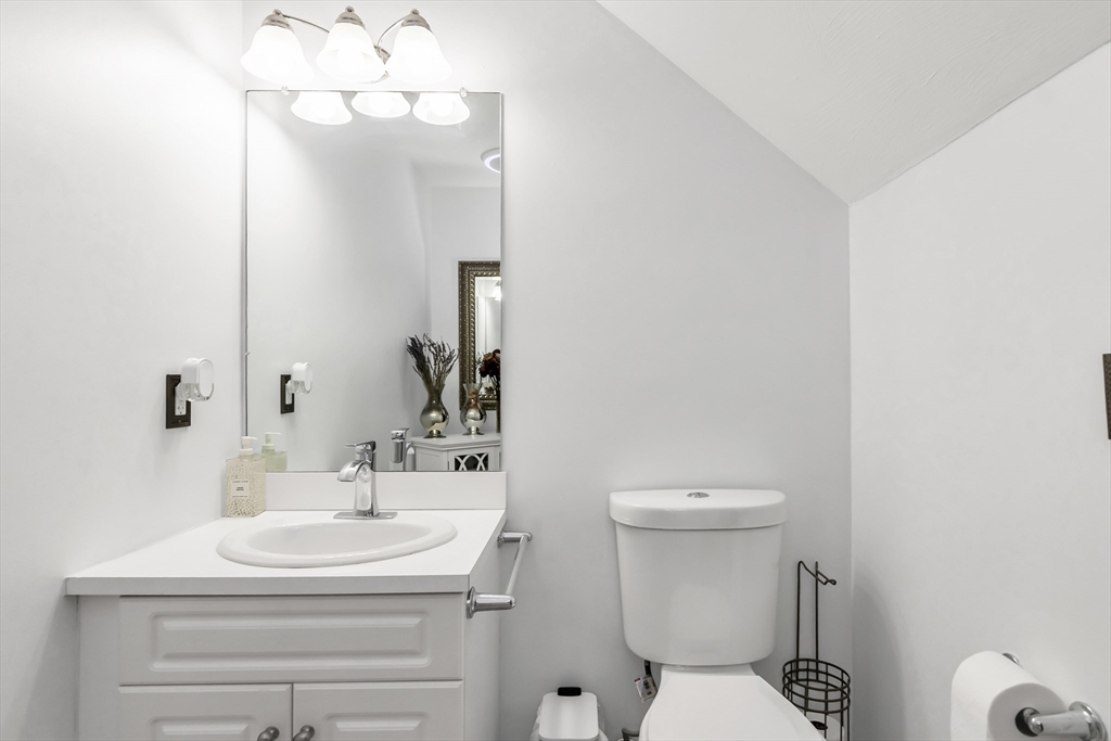 1 Riverview Boulevard, Unit 7204 Methuen, MA 01844 - Photo 13 of 29 a bathroom with a sink and a toilet