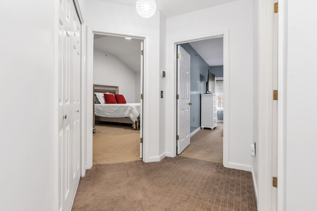 1 Riverview Boulevard, Unit 7204 Methuen, MA 01844 - Photo 18 of 29 a view of a hallway view with three rooms