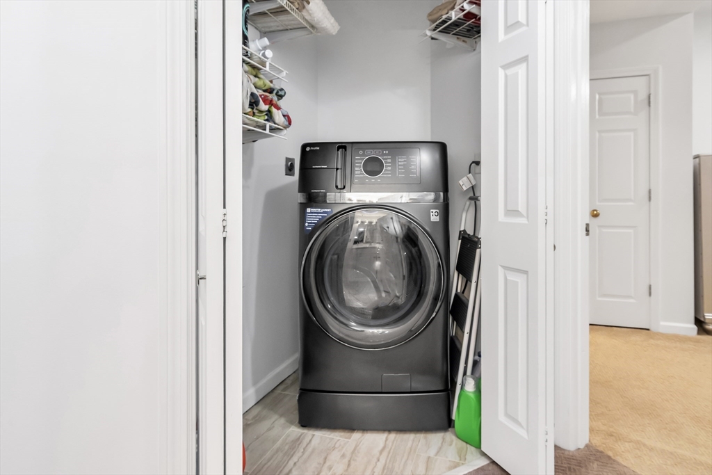 1 Riverview Boulevard, Unit 7204 Methuen, MA 01844 - Photo 19 of 29 a utility room with dryer and washer