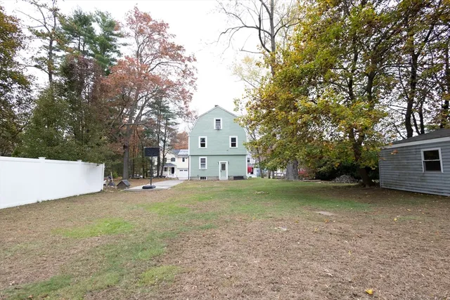 a house with trees in front of it