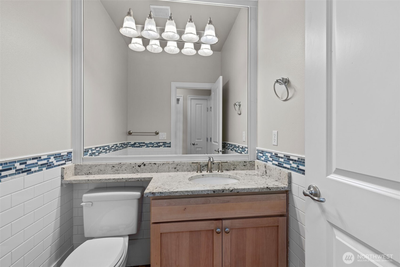 2528 Camas Avenue Northeast Renton, WA 98056 - Photo 11 of 28 a bathroom with a sink and a mirror