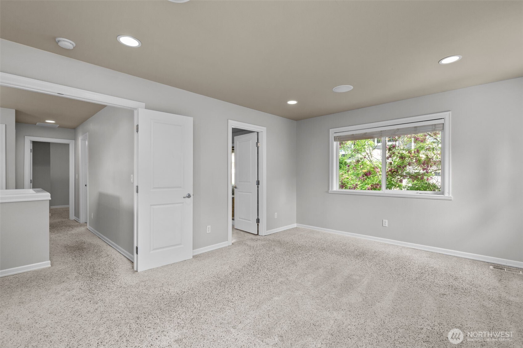 2528 Camas Avenue Northeast Renton, WA 98056 - Photo 16 of 28 an empty room with windows and closet