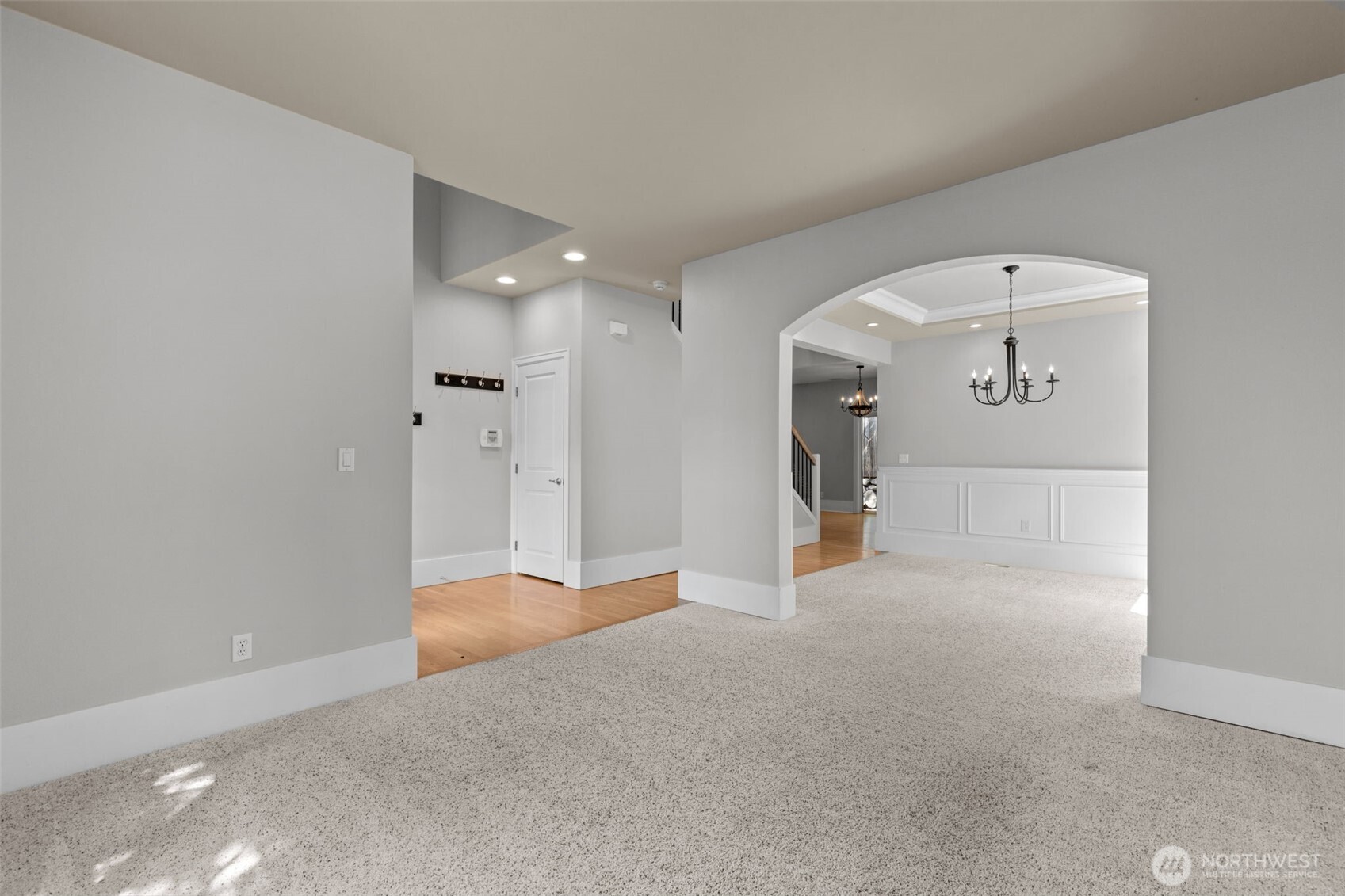 2528 Camas Avenue Northeast Renton, WA 98056 - Photo 28 of 28 a view of a hallway with wooden floor