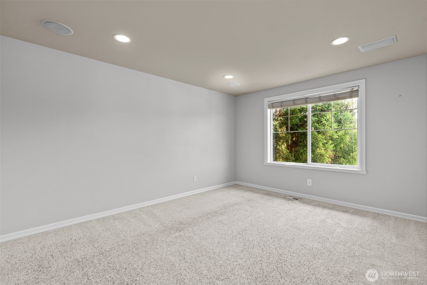 2528 Camas Avenue Northeast Renton, WA 98056 - Photo 5 of 28 an empty room with windows
