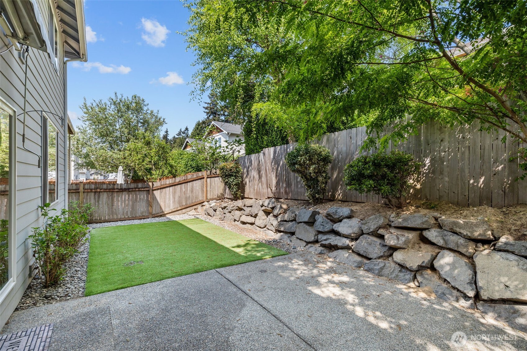 2528 Camas Avenue Northeast Renton, WA 98056 - Photo 7 of 28 a view of a backyard with a garden