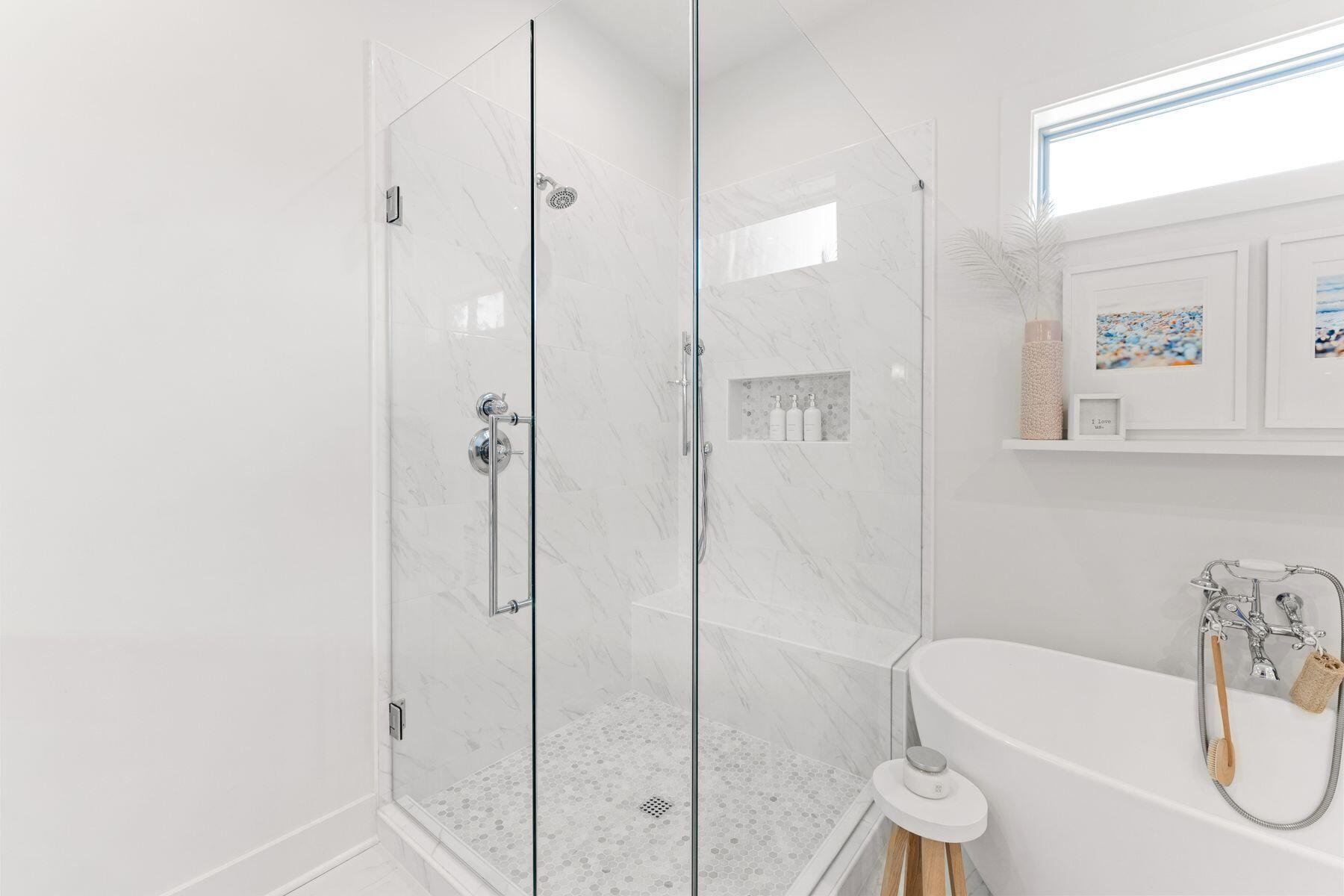 51 Morning Sun Court Santa Rosa Beach, FL 32459 - Photo 23 of 38 a bathroom with a bathtub and a shower