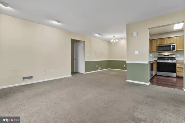 a view of a kitchen with a sink